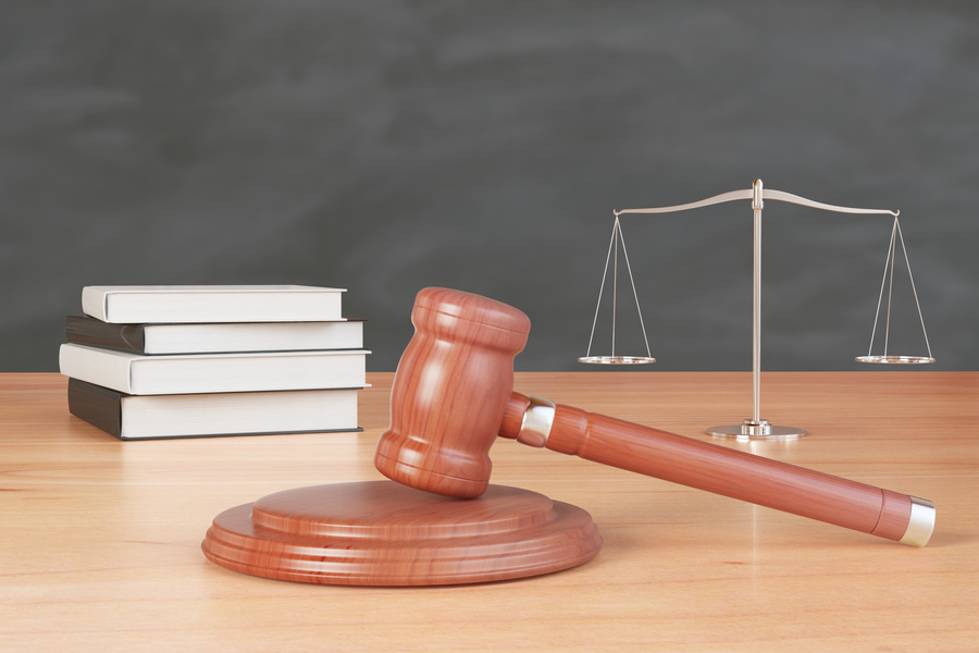 litigation inventory with gavel, books